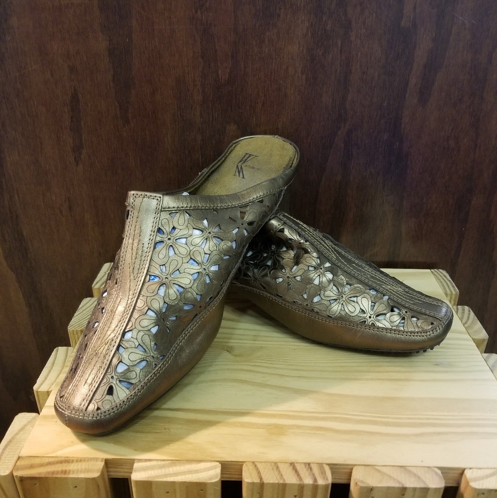 Slide on gold shoes